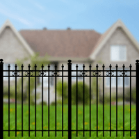 Beautiful Decorative Metal Fence in Front of a Home