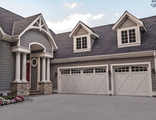 A Home with Overlay Carriage House Garage Doors