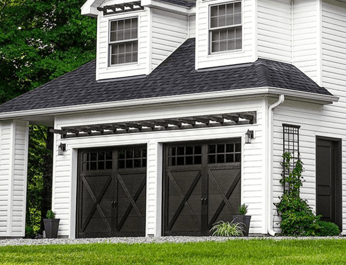 A Home with Overlay Carriage House Garage Doors