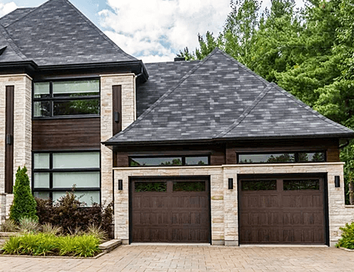 A Home with Stamped Shaker Garage Doors