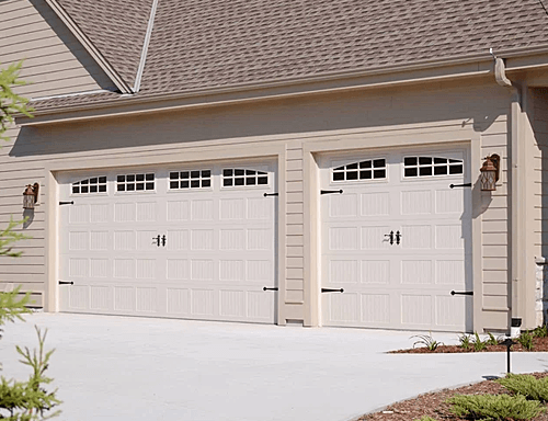 A Home with Stamped Carriage House Garage Doors